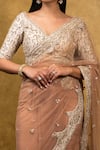 Nitika Gujral_Beige Net Embroidery V Neck Saree With Blouse _at_Aza_Fashions