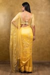 Shop_Nitika Gujral_Yellow Net Embroidery Sweetheart Neck Saree With Blouse _at_Aza_Fashions