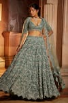 Buy_Nitika Gujral_Green Tulle Embroidered Floral Plunge V Neck Bridal Lehenga Set _at_Aza_Fashions