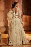 Shop_Nitika Gujral_Cream Tulle Embroidered Floral Sweetheart Neck Bridal Lehenga Set _at_Aza_Fashions