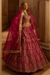 Buy_Nitika Gujral_Fuchsia Raw Silk Embroidered Floral Leaf Neck Bridal Lehenga Set _at_Aza_Fashions