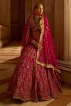 Shop_Nitika Gujral_Fuchsia Raw Silk Embroidered Floral Leaf Neck Bridal Lehenga Set _at_Aza_Fashions