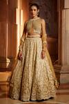 Buy_Nitika Gujral_Gold Tulle Sequins, Crystals, Beads High Floral Embroidered Bridal Lehenga Set _at_Aza_Fashions
