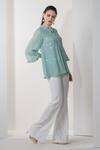 Namrata Joshipura_Blue Georgette Embellished Floral Motifs Notched Amaryllis Sequin Top _Online_at_Aza_Fashions