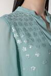 Buy_Namrata Joshipura_Blue Georgette Embellished Floral Motifs Notched Amaryllis Sequin Top _Online_at_Aza_Fashions