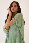 Shop_Nikasha_Green 100% Viscose Georgette Printed Bandhani V Neck Tunic And Skirt Set _Online_at_Aza_Fashions
