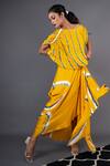 Shop_Nupur Kanoi_Yellow Bemberg Satin Print Leheriya One Shoulder Top And Skirt Set  _Online_at_Aza_Fashions