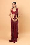 Buy_Neha Khullar_Red Net Embroidery Sequin Sweetheart Neck Pre-draped Saree With Blouse _at_Aza_Fashions