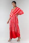 Buy_Nupur Kanoi_Red Crepe V Neck Shibori Draped Jumpsuit _at_Aza_Fashions