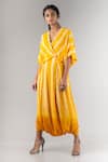 Nupur Kanoi_Yellow Crepe V Neck Shibori Draped Jumpsuit _Online_at_Aza_Fashions