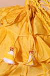 Shop_Nikasha_Yellow Tassels, Fringe Chanderi Tiered Potli Bag _at_Aza_Fashions