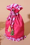 Buy_Nikasha_Pink Tassels Leheriya Print Potli Bag _at_Aza_Fashions