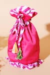 Shop_Nikasha_Pink Tassels Leheriya Print Potli Bag _at_Aza_Fashions