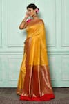 Nazaakat by Samara Singh_Yellow Banarasi Katan Woven Floral Saree_Online_at_Aza_Fashions