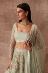 Shop_Neeta Lulla_Green Tulle Mirror, Thread And Beads Square Neck Iris Bridal Lehenga Set_Online_at_Aza_Fashions