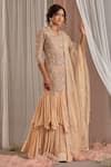 Buy_Nidhika Shekhar_Beige Georgette Hand Embroidered Sequins V Neck Ruffle Lehenga Kurta Set _at_Aza_Fashions