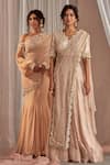 Shop_Nidhika Shekhar_Beige Crinkle Tissue Hand Embroidered Sequins V Neck Draped Blouse And Lehenga Set_Online_at_Aza_Fashions