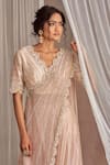 Nidhika Shekhar_Beige Crinkle Tissue Hand Embroidered Sequins V Neck Draped Blouse And Lehenga Set_at_Aza_Fashions