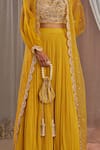 Nidhika Shekhar_Yellow Silk Embroidered Sequins Round Bead Jacket Lehenga Set _Online_at_Aza_Fashions