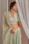 Nidhika Shekhar_Green Silk Embroidered Sequins V Neck Floral Lehenga Set _Online_at_Aza_Fashions