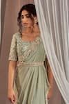 Buy_Nidhika Shekhar_Green Crepe Embroidered Sequins Leaf Neck Pre-draped Saree With Blouse _Online_at_Aza_Fashions