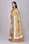 Nazaakat by Samara Singh_Beige Saree Banarasi Pure Raw  Blouse Woven Floral_Online_at_Aza_Fashions