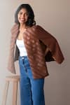 Shop_Rhe-Ana_Brown Poly/pu Embellished Chevron Round Cape  _at_Aza_Fashions