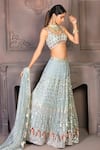 Buy_Izzumi Mehta_Blue Lucknowi Leaf Neck Embroidered Bridal Lehenga Set_at_Aza_Fashions