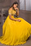 Buy Izzumi Mehta Yellow Net, Korean Crepe One Shoulder Embroidered Off Blouse And Lehenga Set at Aza Fashions Buy_Izzumi Mehta_Yellow Net, Korean Crepe One Shoulder Embroidered Off Blouse And Lehenga Set _at_Aza_Fashions
