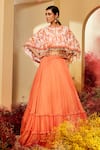 Buy_Priyaa_Orange Georgette Tie And Dye Floral Tiered Lehenga Set With Cape _at_Aza_Fashions