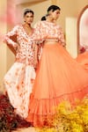 Shop_Priyaa_Orange Georgette Tie And Dye Floral Tiered Lehenga Set With Cape _at_Aza_Fashions