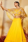 Priyaa_Yellow Cape Net, Lehenga And Choli Georgette Floral Tiered Set With Embroidered _Online_at_Aza_Fashions