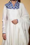 Taika By Poonam Bhagat_White Chanderi, Lycra Net V Neck Applique Anarkali Set _at_Aza_Fashions