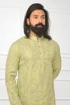 Nitesh Singh Chauhan_Green Cotton Silk Blend Embroidered Kurta Set_at_Aza_Fashions