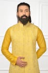 Nitesh Singh Chauhan_Yellow Cotton Silk Blend Embroidered Bundi And Kurta Set  _at_Aza_Fashions