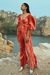 EASE_Orange Velvet Chitta Buttis V Neck Bell Sleeve Jumpsuit _Online_at_Aza_Fashions