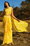 Paulmi and Harsh_Yellow Crepe Sweetheart Neck Printed Pre-draped Saree Set _Online_at_Aza_Fashions