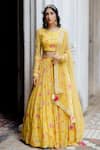 Paulmi and Harsh_Yellow Lehenga And Blouse Georgette Dupatta Net Floral Print Bridal Set _Online_at_Aza_Fashions