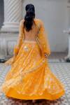 Shop_Paulmi And Harsh_Orange Lehenga And Blouse Organza Dupatta Net Sweetheart Neck Bridal Set_at_Aza_Fashions