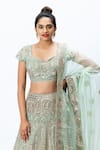 Buy_Nirmooha_Green Organza Embroidered Scoop Neck Hand Lehenga Set _Online_at_Aza_Fashions