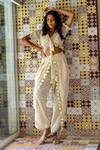 Shop_Surily G_Ivory Cotton Cutwork V Neck Tie-up Crop Top _at_Aza_Fashions