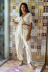 Buy_Surily G_Ivory Cotton Cutwork V Neck Tie-up Crop Top _at_Aza_Fashions
