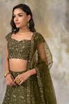 Shop_Pooja Peshoria_Green Raw Silk Sweetheart Neck Embellished Bridal Lehenga Set _Online_at_Aza_Fashions