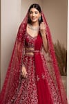 Pooja Peshoria_Red Embroidery Cutdana V Neck Floral Bridal Lehenga Set_at_Aza_Fashions