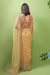 Shop_Prevasu_Gold Net/tulle Embroidery Sequins V Neck Saree With Blouse  _at_Aza_Fashions