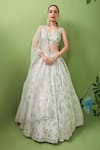 Buy Prevasu Ivory Blouse And Dupatta Net/tulle, Lehenga Floral Embroidered Bridal Set at Aza Fashions Buy_Prevasu_Ivory Blouse And Dupatta Net/tulle, Lehenga Floral Embroidered Bridal Set _at_Aza_Fashions