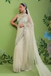 Buy_Prevasu_Off White Net/tulle Embroidery Sequins V Neck Saree With Blouse  _at_Aza_Fashions