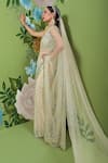 Prevasu_Off White Net/tulle Embroidery Sequins V Neck Saree With Blouse _Online_at_Aza_Fashions