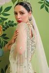 Prevasu_Off White Net/tulle Embroidery Sequins V Neck Saree With Blouse _at_Aza_Fashions