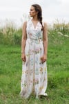 Shop_Pozruh by Aiman_White Pure Hemp Surplice Floral Printed Jumpsuit  _at_Aza_Fashions